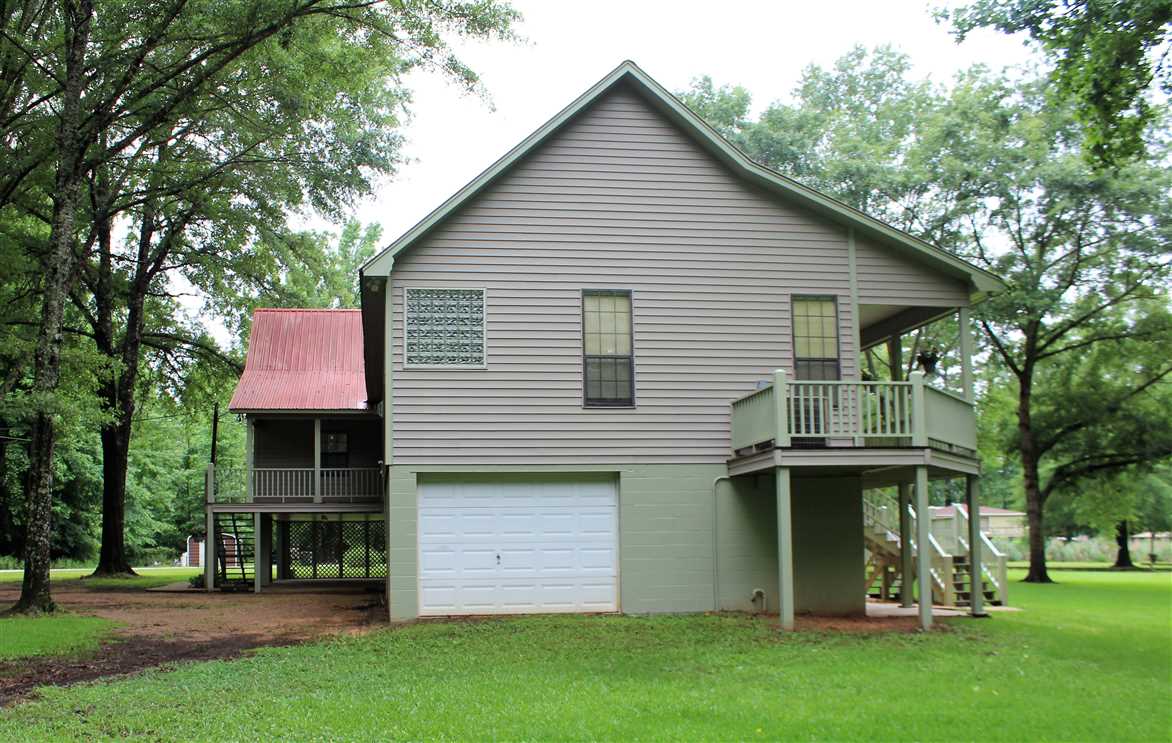 Waterfront Dream Sitting Proudly on Clear Lake Cove Real estate listing