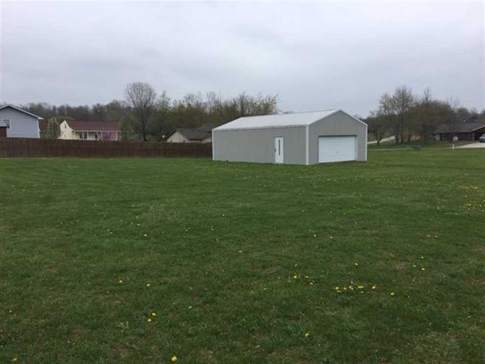 1/2 Acre Lot, 30x40 Shop Concrete Floor, Electric, Water and Sewer Available. Mountain View MO Area Howell County Call Linda 417-274-0142 Real estate listing