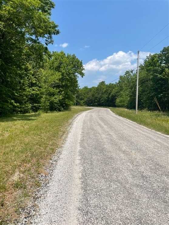 5.81+/-acres Beautiful wooded property located in the reputable Blueberry Bluffs. Real estate listing