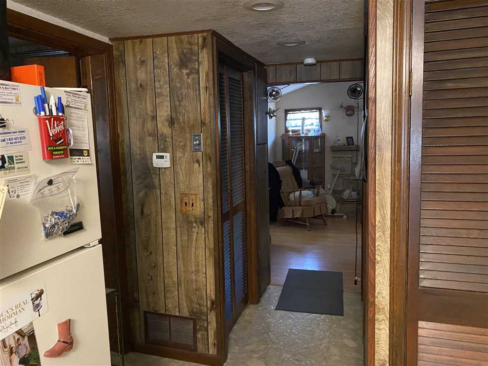 3 bedroom full-time living Truman Lake home with lake access. Adjoins Corp ground Real estate listing