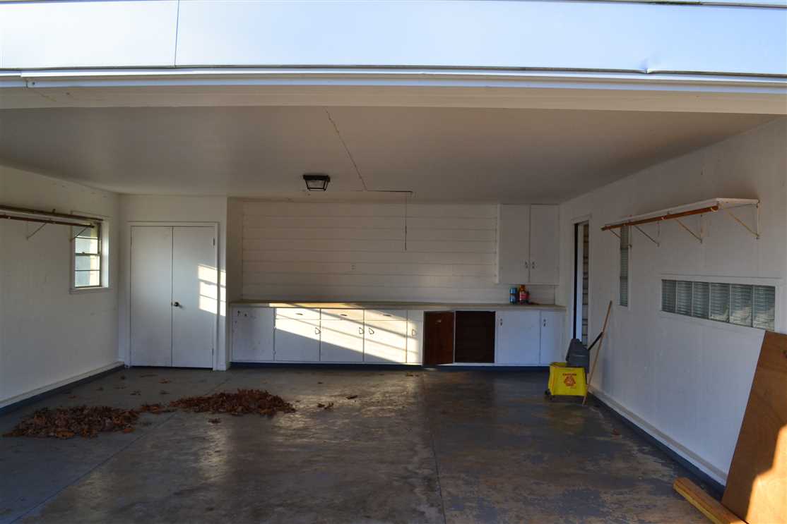 Home with Hwy 65 frontage. Home consists of 4 bedroom and 4 bath. Has a partial basement which could be made into a play room or game room ect. Sitting on a 1.19 ac.+/- lot. Has a in ground pool and a tennis court in the back . Real estate listing