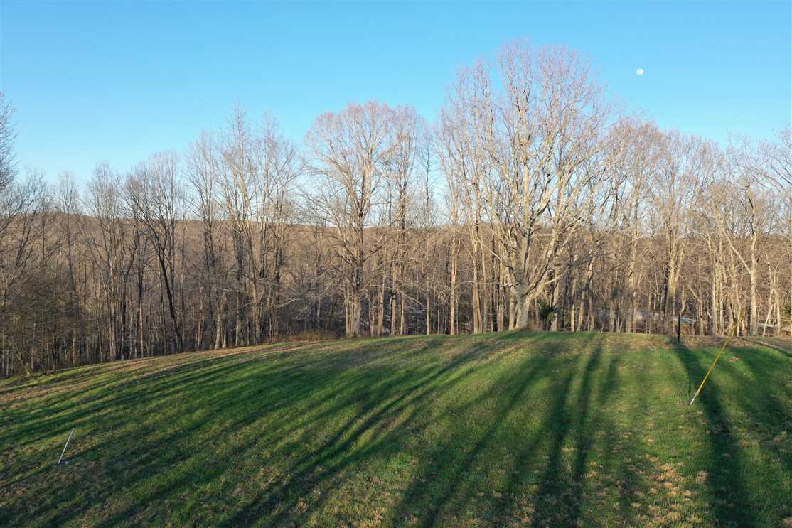 Beautiful lot ready for the home of your dreams, minutes from Kentucky Lake! Real estate listing